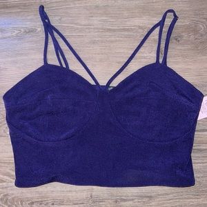Purple tank top with cross straps in the front